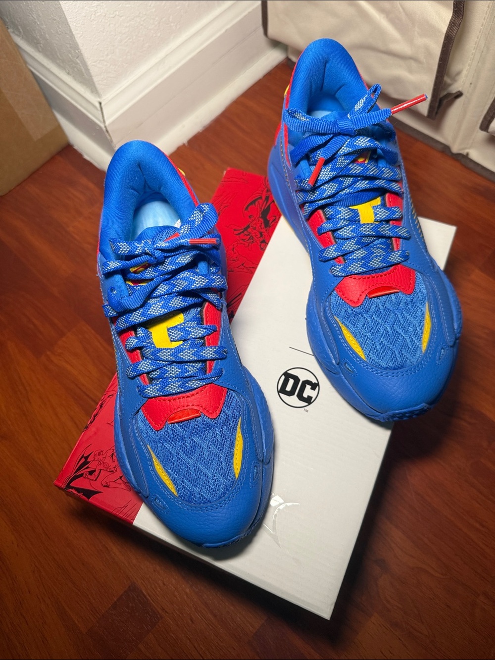 Puma Kids Blue Sneakers with Red & Yellow Accents